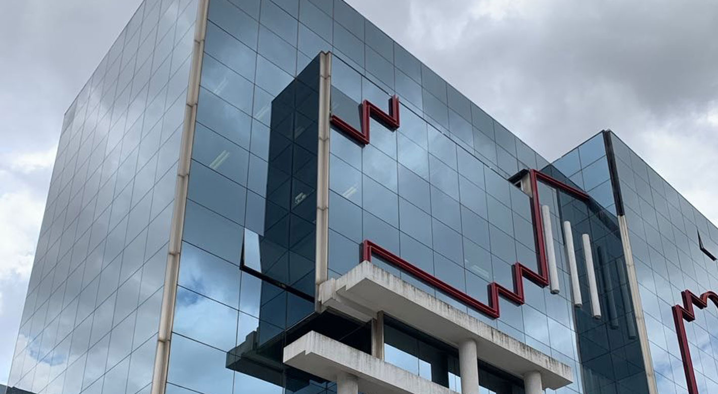 View of Lancom Athens Data Center building with modern glass architecture.